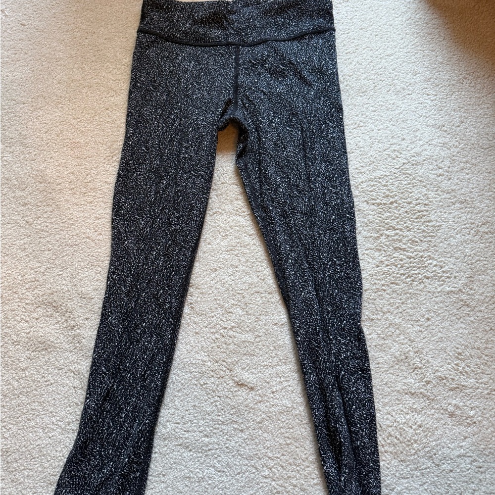 Athletic girl, black leggings size 12